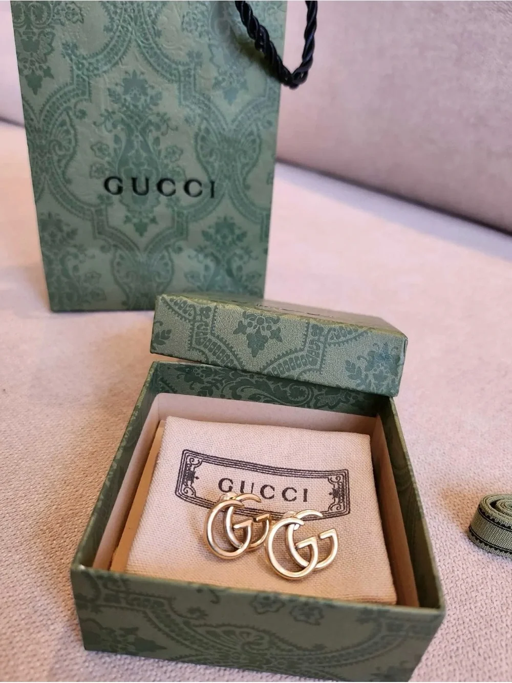 Gucci Gold tone Double G Logo Earrings with Branded Pouch